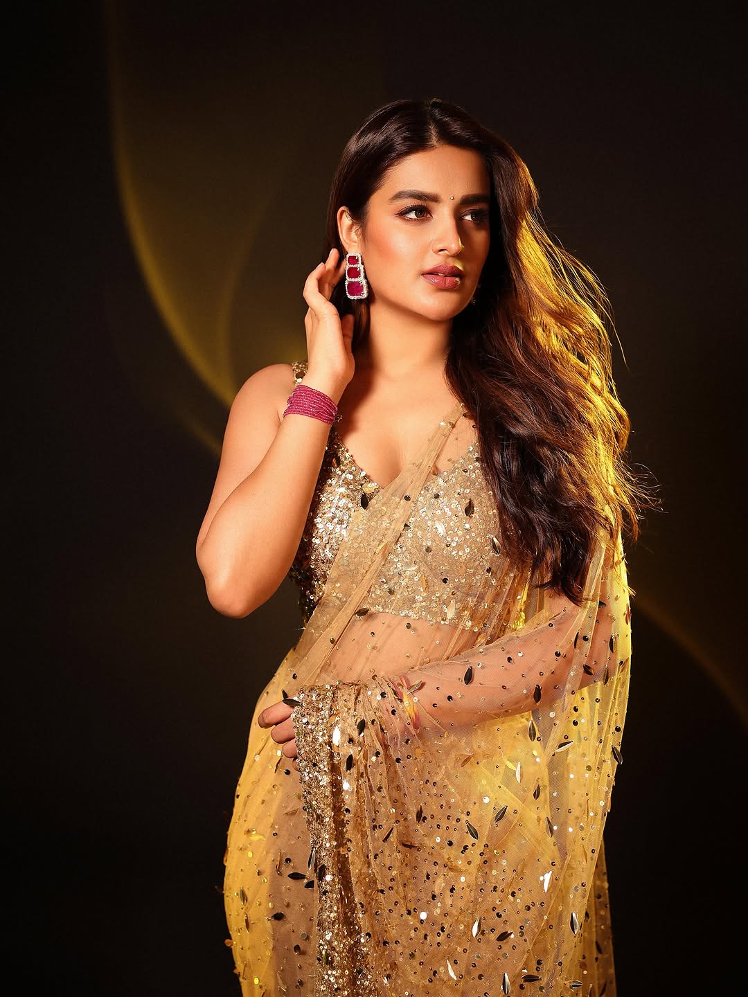 Nidhi Agerwal in Citrine saree