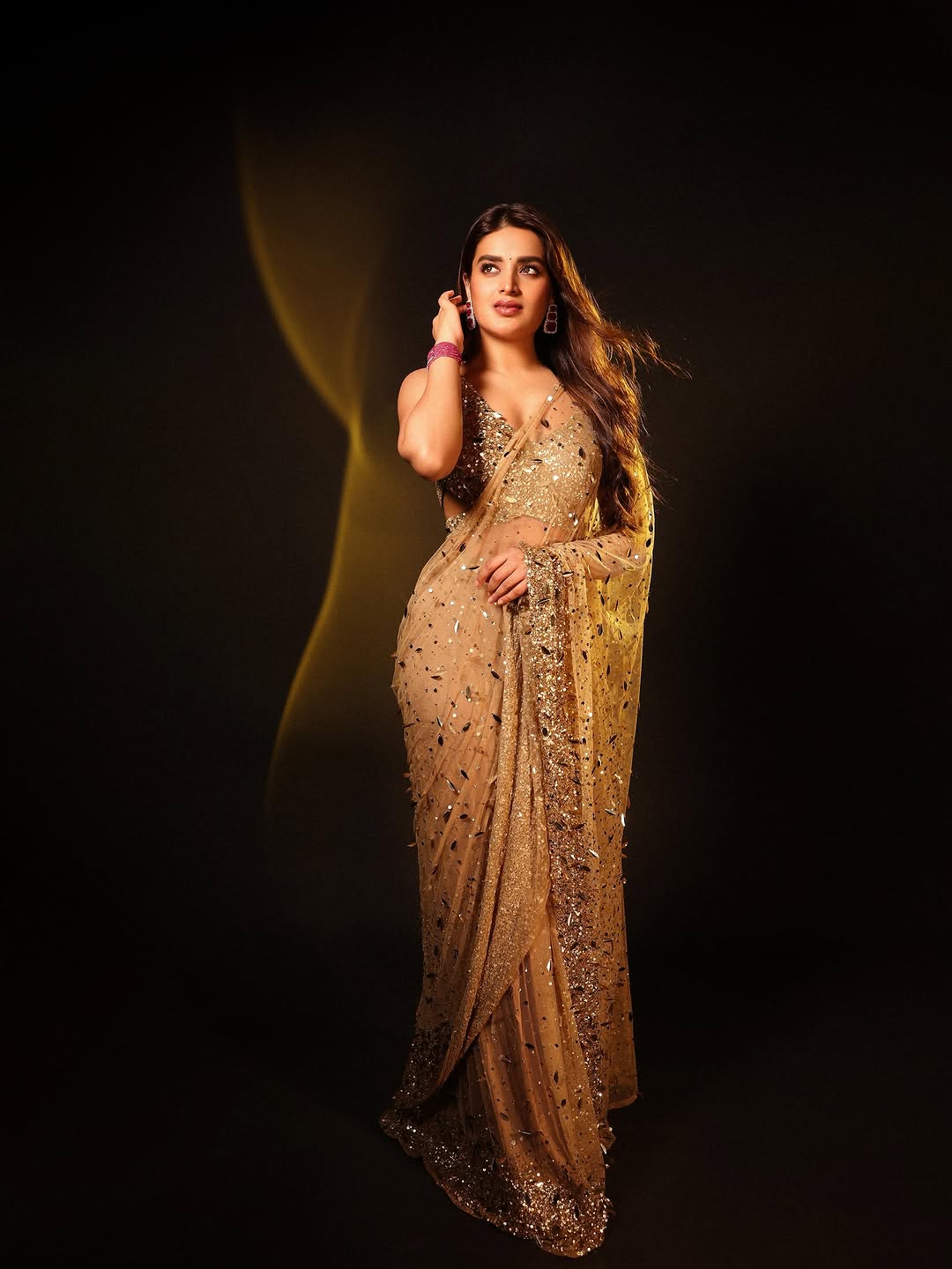 Nidhi Agerwal in Citrine saree