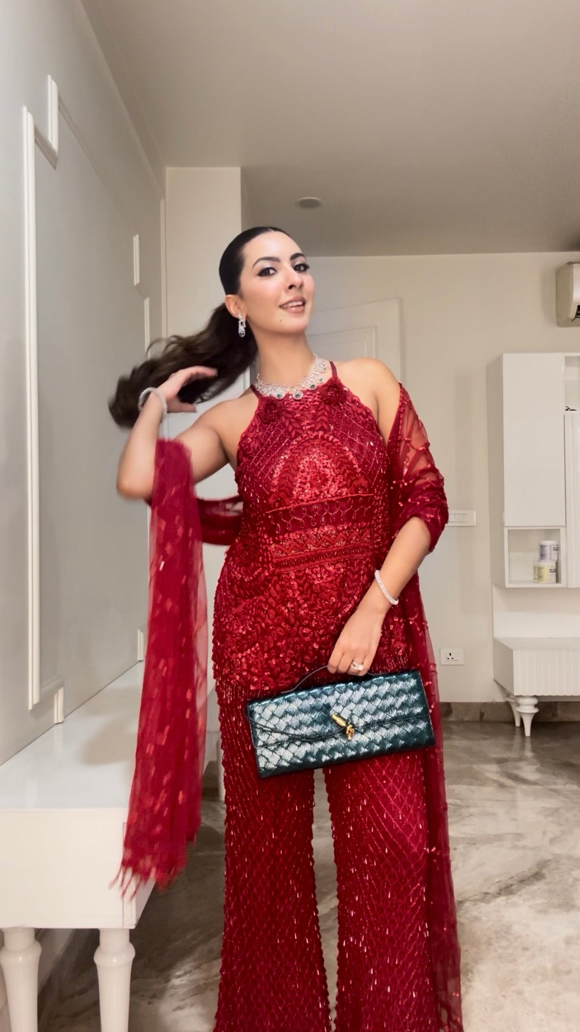 Niki Mehra in Red sharara set