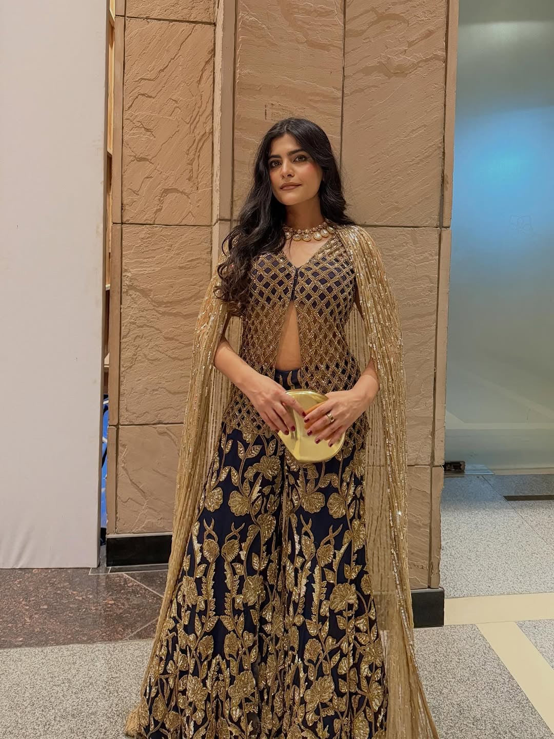 Kritika Khurana in Royal indigo with cape