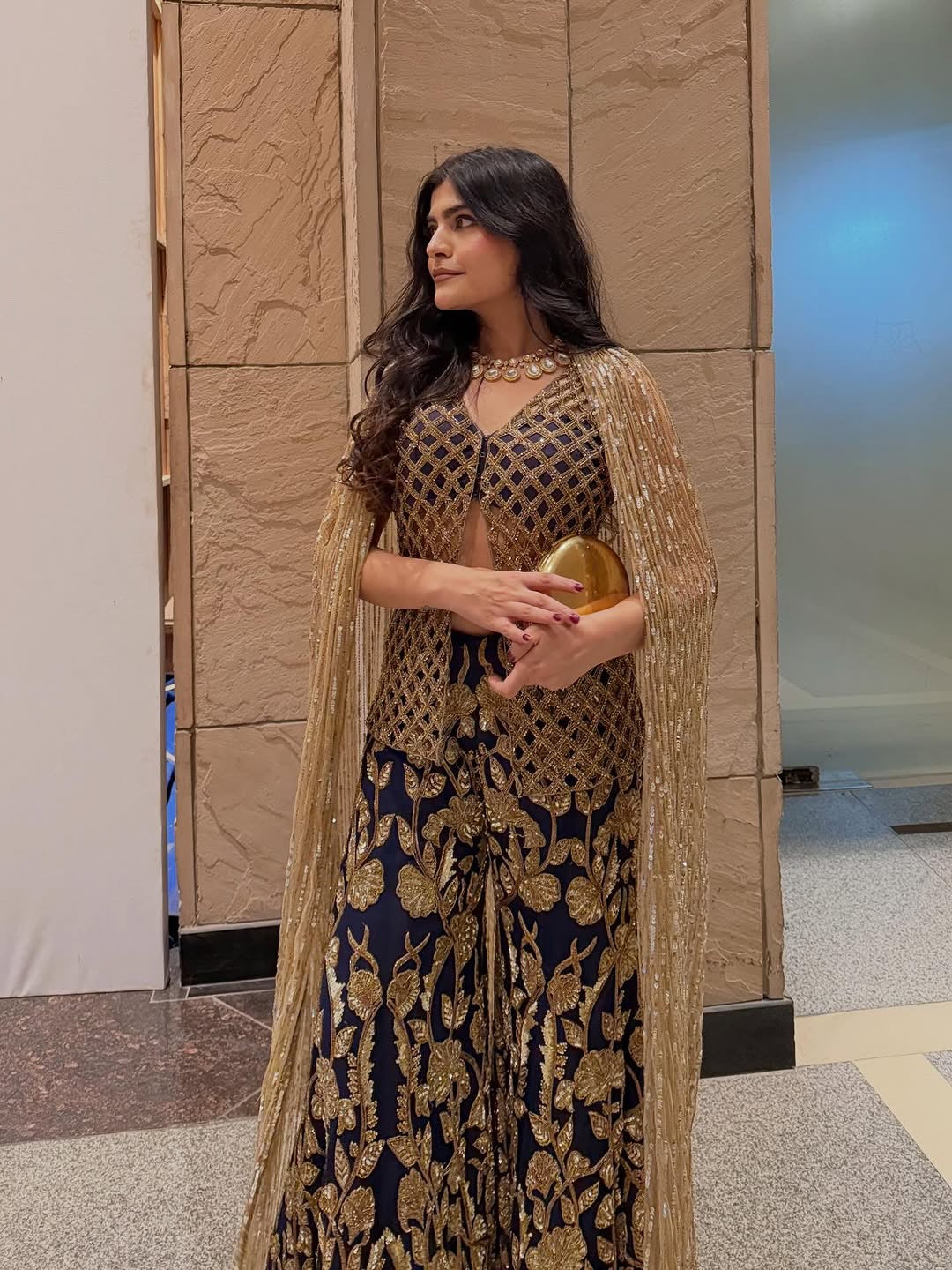 Kritika Khurana in Royal indigo with cape