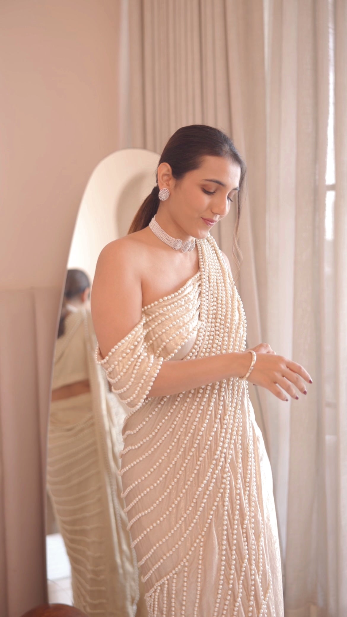 Masoom Minawala in sunlit pearl saree