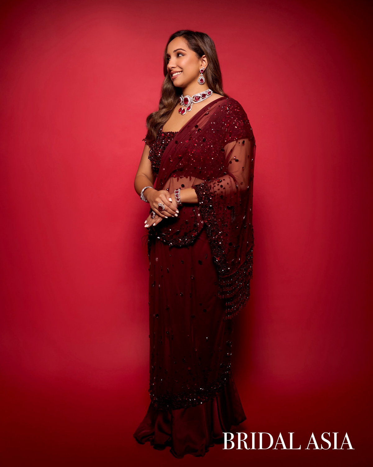 Sonali fabiani in SHIMMER MAROON SAREE