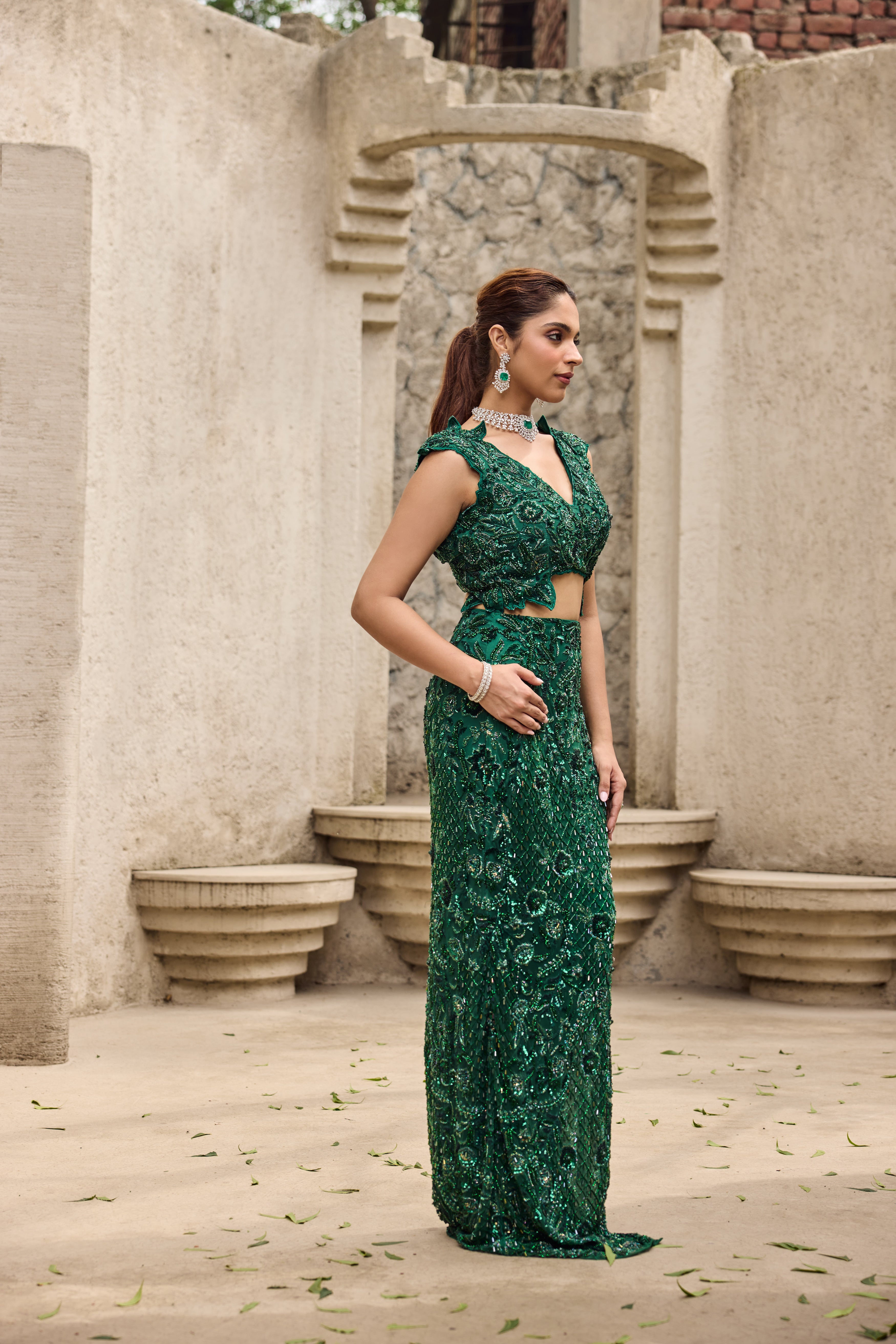 Deep shimmering green cut work gown