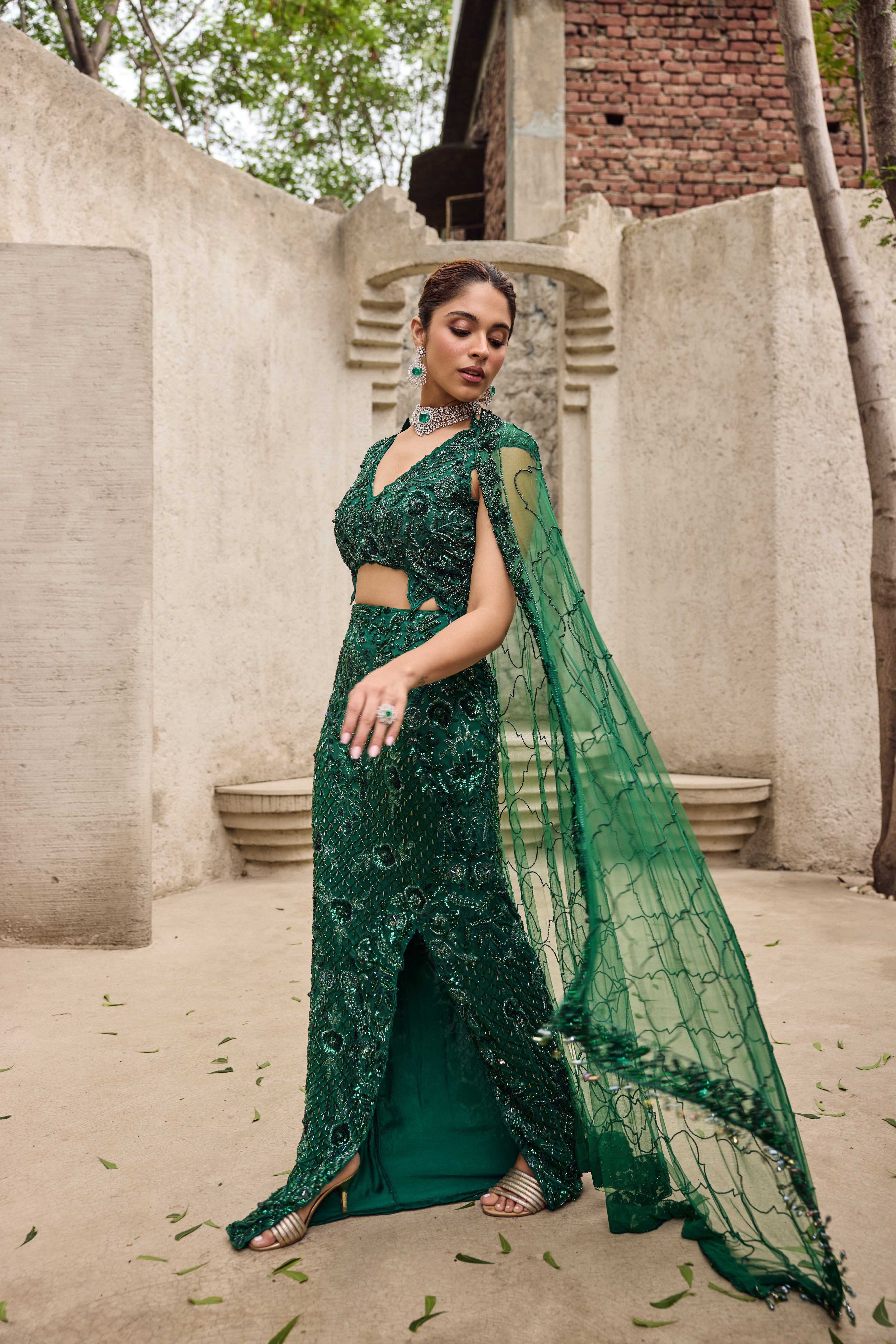 Deep shimmering green cut work gown